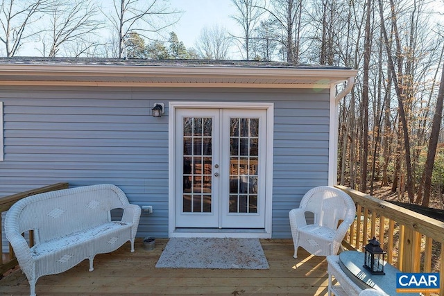 wooden deck featuring french doors