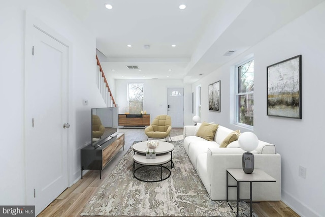 living room with wood-type flooring