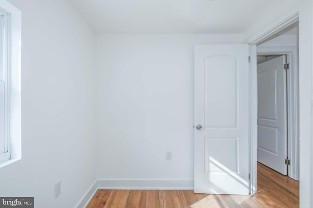 empty room with light wood-type flooring