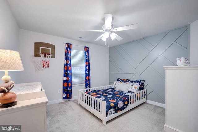 carpeted bedroom with ceiling fan