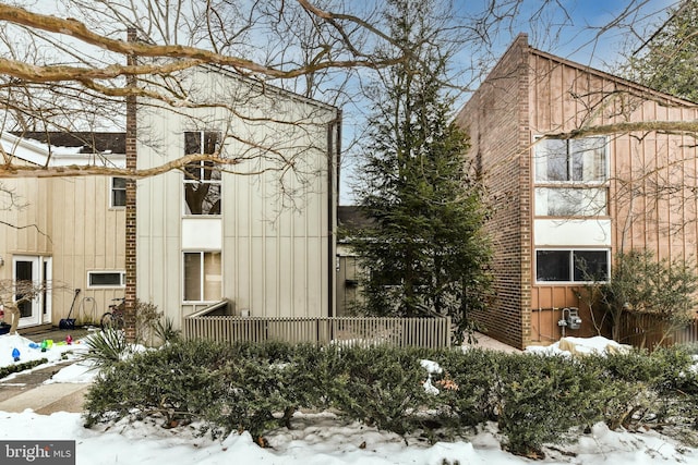 view of snow covered property