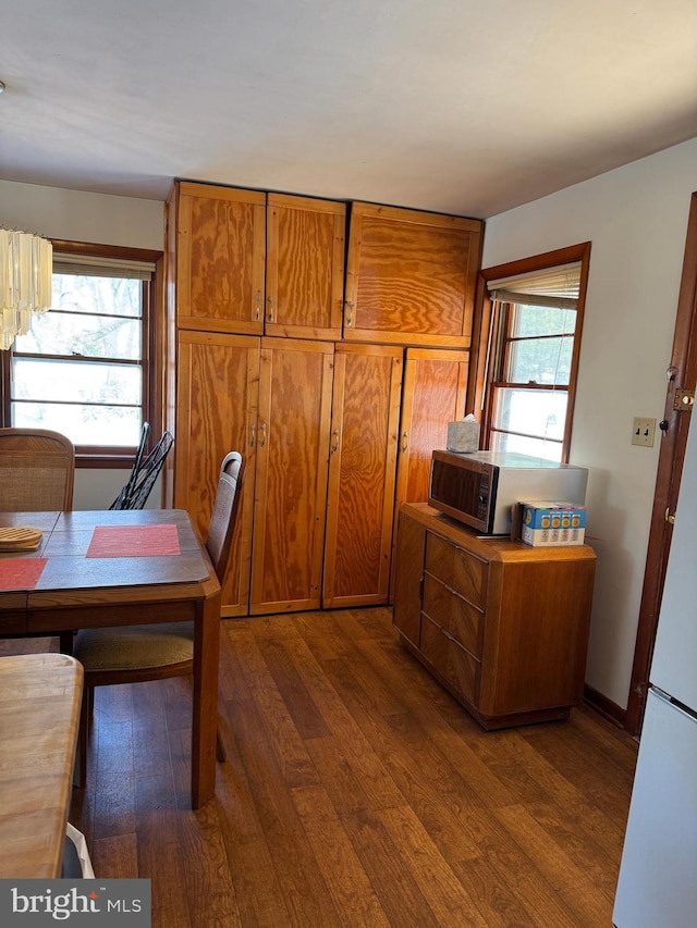 office area featuring dark wood-type flooring