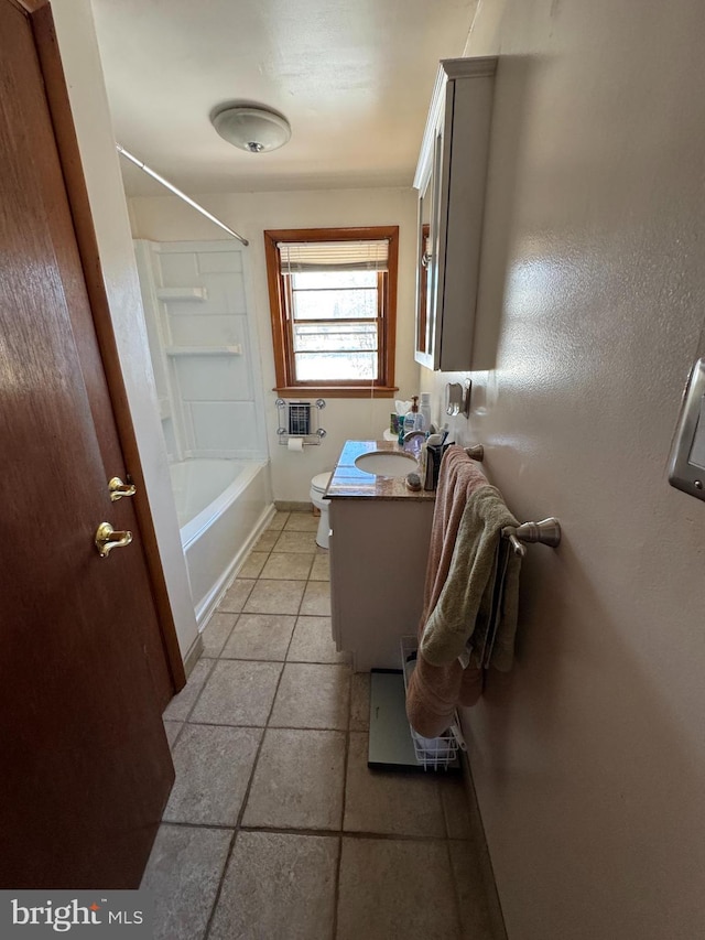 full bathroom featuring tile patterned flooring, vanity, toilet, and shower / bathing tub combination