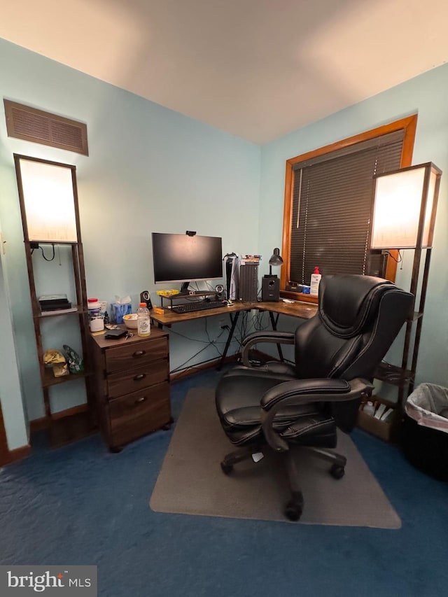 office area with dark colored carpet