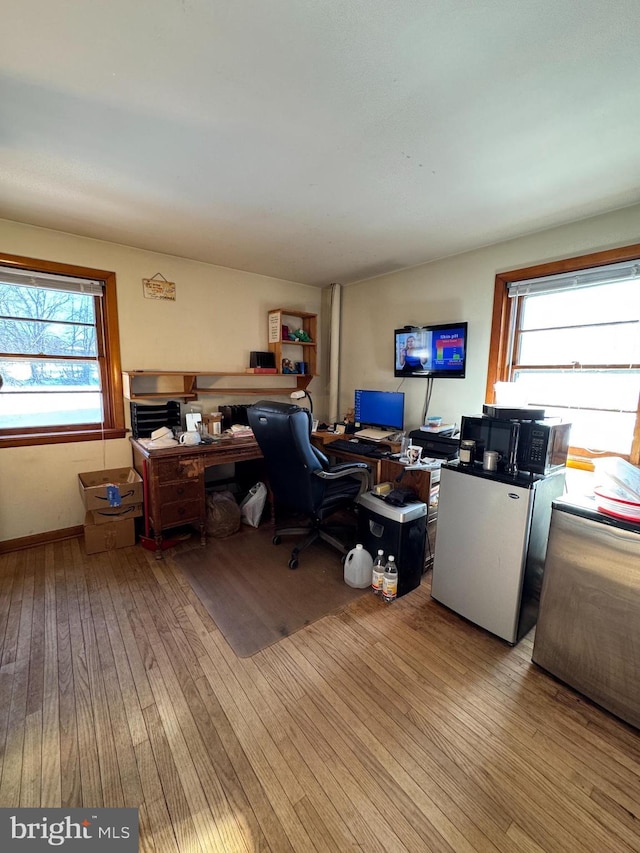 office featuring light wood-type flooring and a wealth of natural light