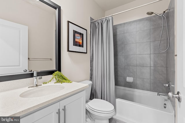 full bathroom featuring vanity, toilet, and shower / bath combo with shower curtain