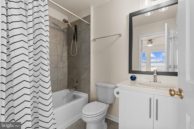 full bathroom with vanity, shower / bath combo, and toilet