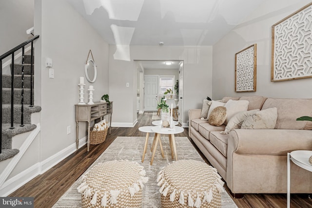 living room with dark hardwood / wood-style floors