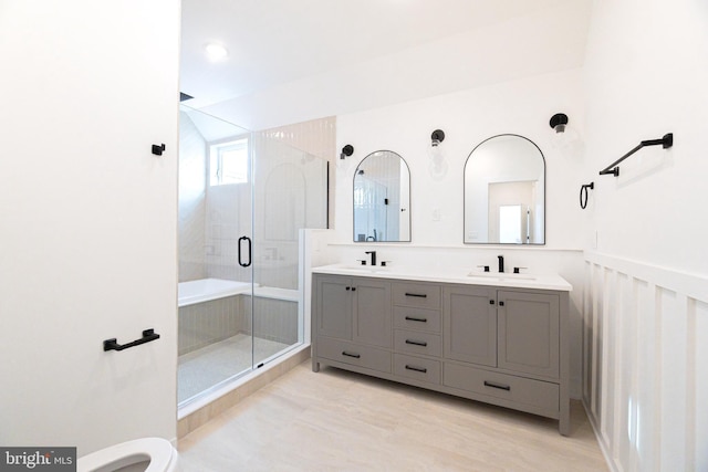 bathroom with vanity and walk in shower