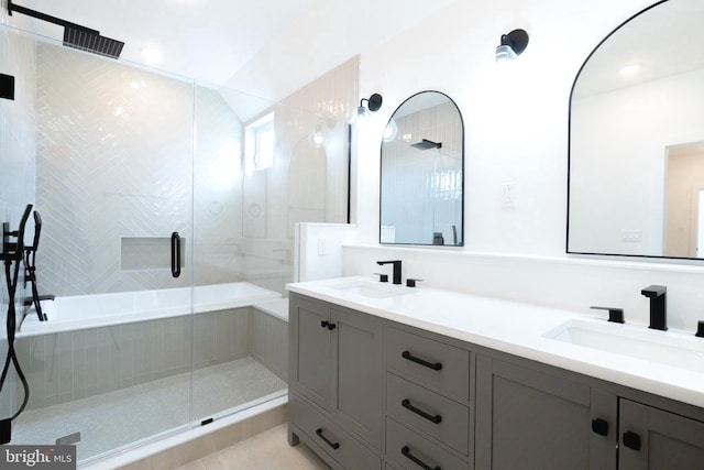 bathroom with vanity and an enclosed shower