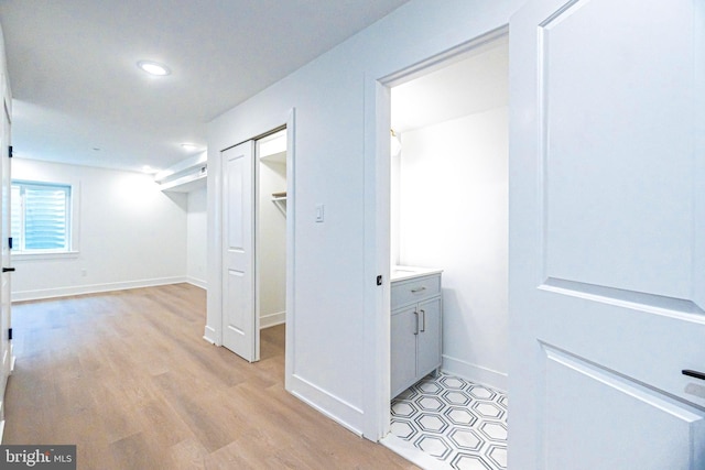 corridor featuring light wood-type flooring