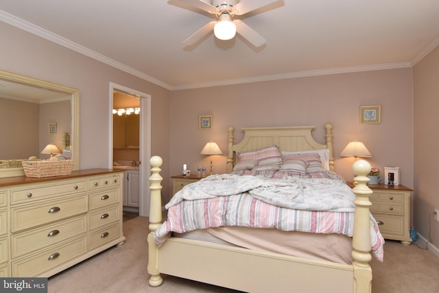 bedroom featuring light carpet, ensuite bathroom, ceiling fan, and ornamental molding