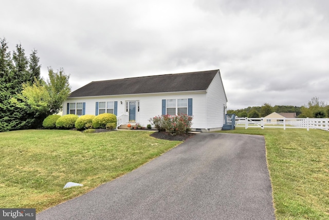 view of front of home with a front yard