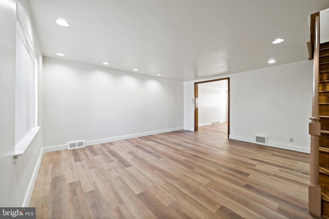 unfurnished room featuring light wood-type flooring