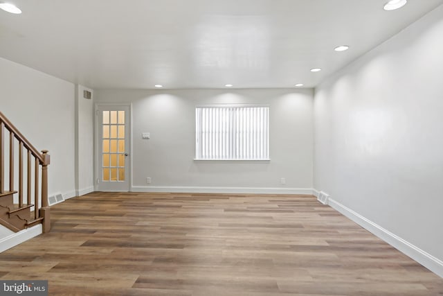 unfurnished room featuring light wood-type flooring