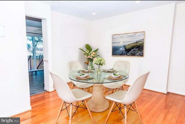 dining room with hardwood / wood-style floors