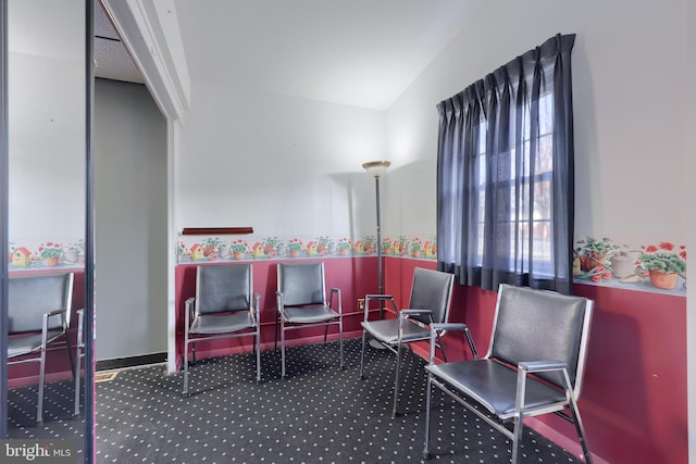 living area featuring carpet floors