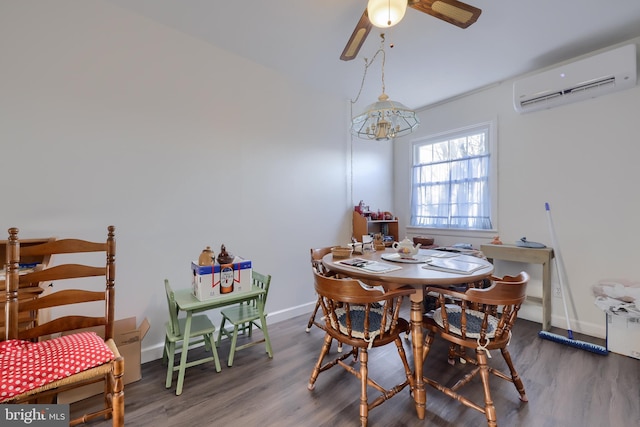 dining area with a wall mounted air conditioner, dark hardwood / wood-style flooring, and ceiling fan with notable chandelier