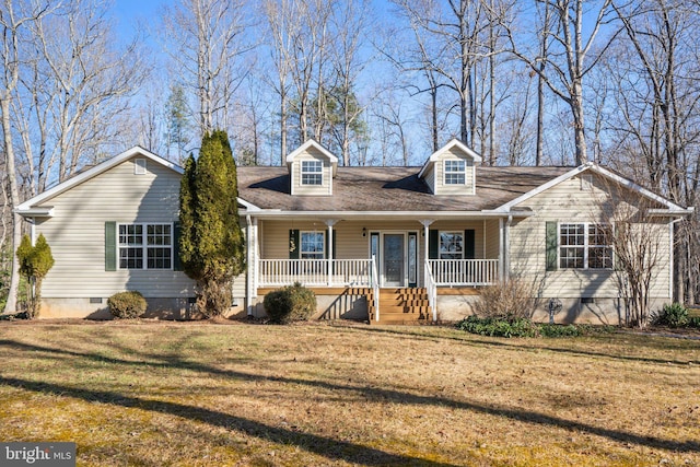 new england style home with a porch and a front lawn