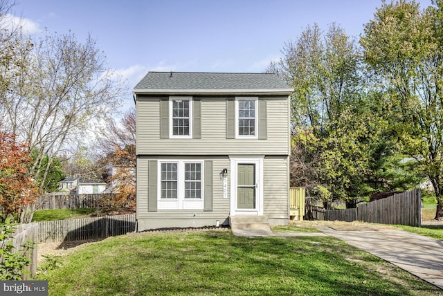 view of front of home with a front yard