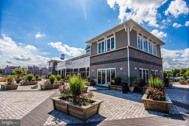 back of house with a patio