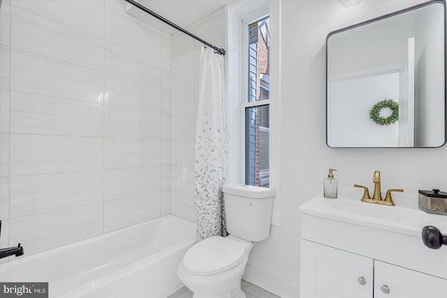 full bathroom with vanity, toilet, and shower / bath combo with shower curtain