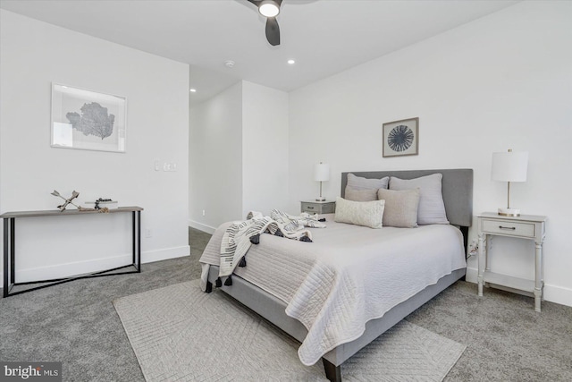 bedroom with ceiling fan and light carpet