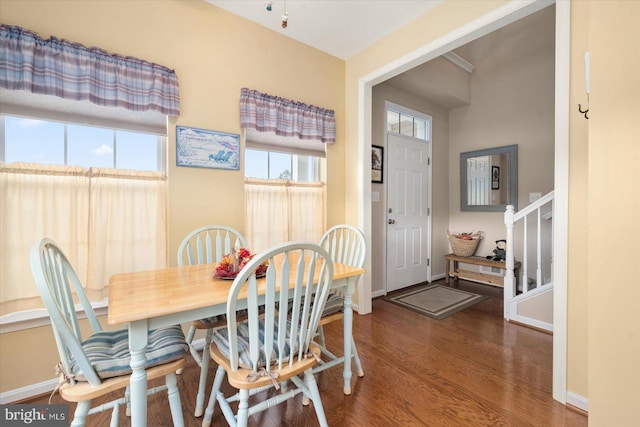 dining room with wood-type flooring