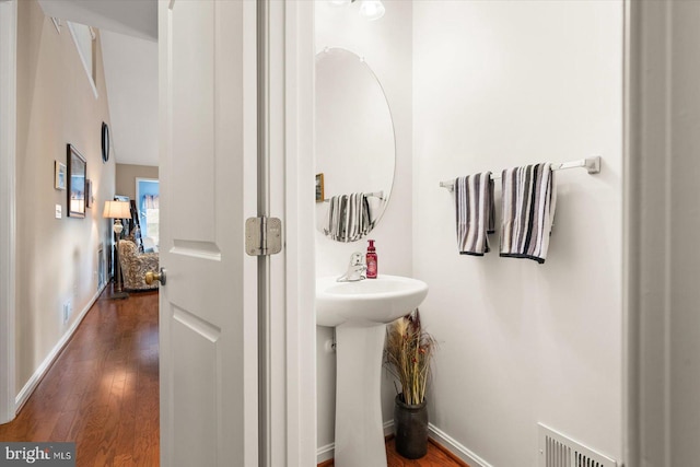 bathroom featuring wood-type flooring