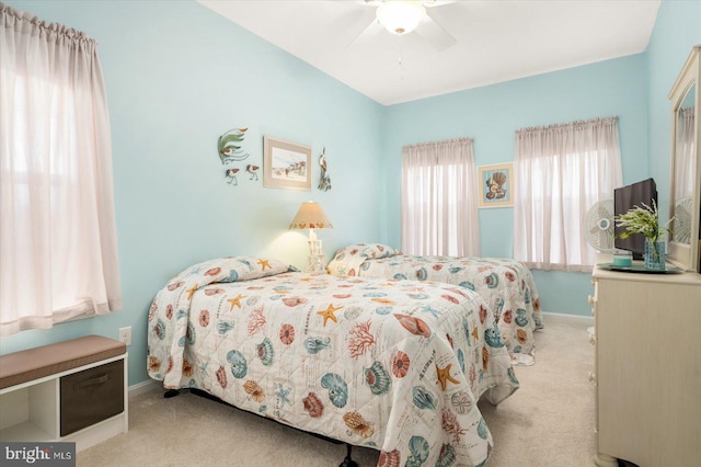 bedroom with light colored carpet and ceiling fan