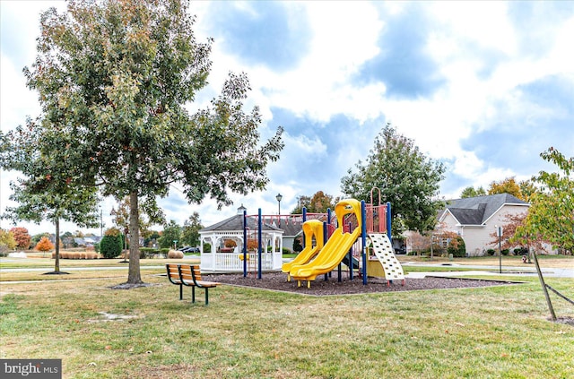 view of playground featuring a lawn