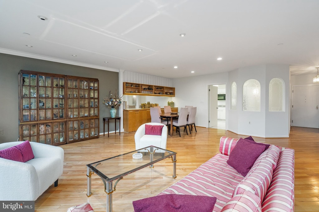 living room with light hardwood / wood-style floors