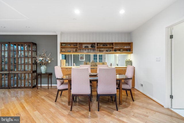 dining room with light wood-type flooring