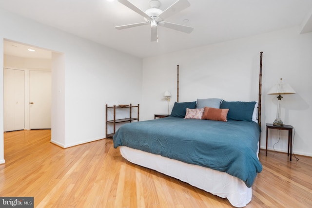 bedroom featuring hardwood / wood-style floors and ceiling fan