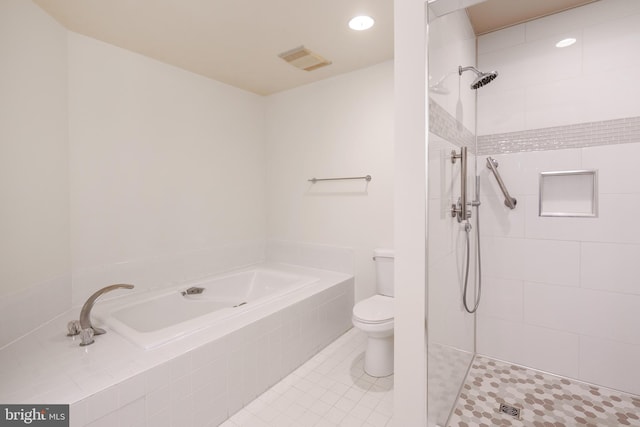 bathroom featuring tile patterned floors, plus walk in shower, and toilet