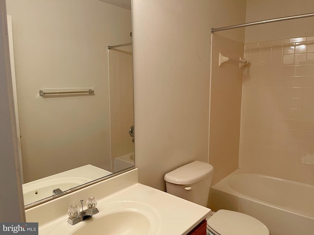 full bath with washtub / shower combination, vanity, and toilet