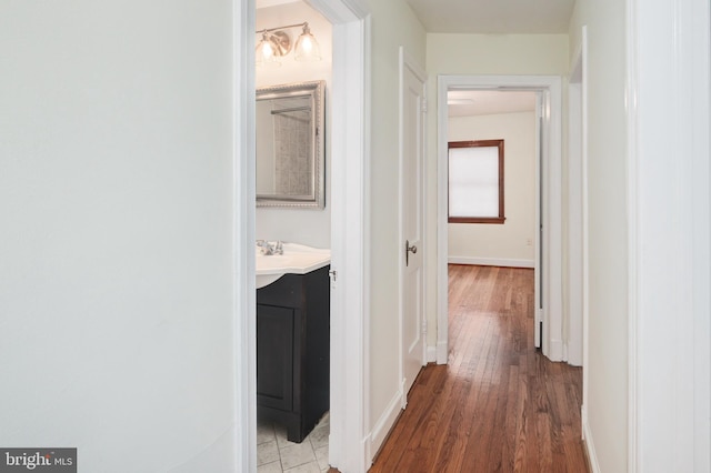 corridor featuring light wood-type flooring