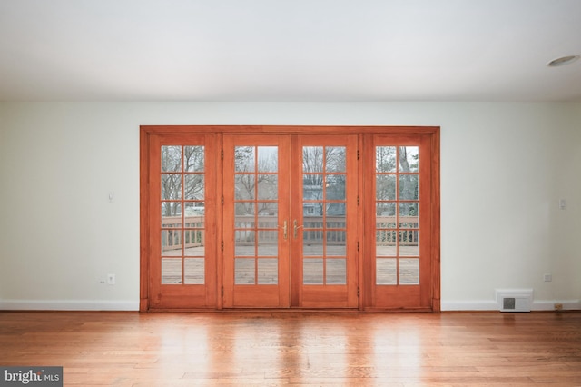 doorway featuring light wood-type flooring