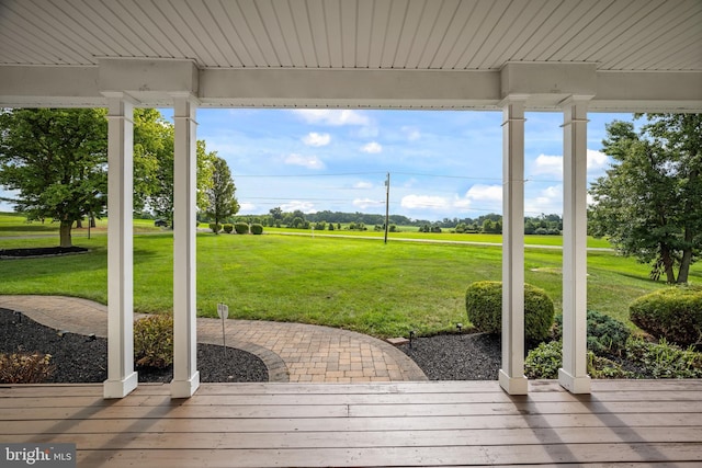 deck featuring a lawn