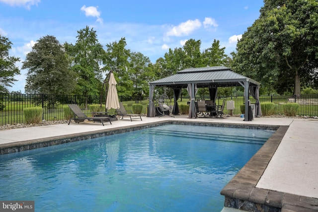 view of pool with a gazebo and a patio