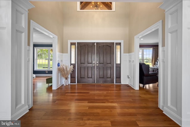 entrance foyer featuring dark hardwood / wood-style flooring