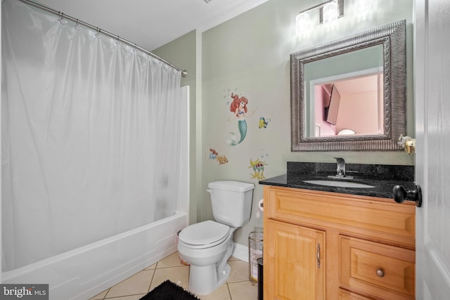 full bathroom with tile patterned flooring, vanity, shower / bath combo, and toilet