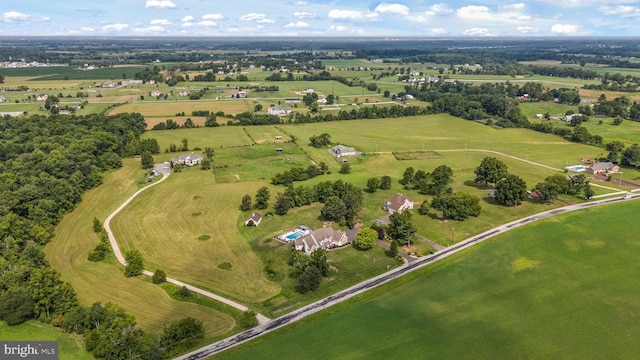 birds eye view of property featuring a rural view