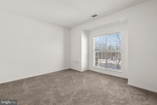 view of carpeted spare room