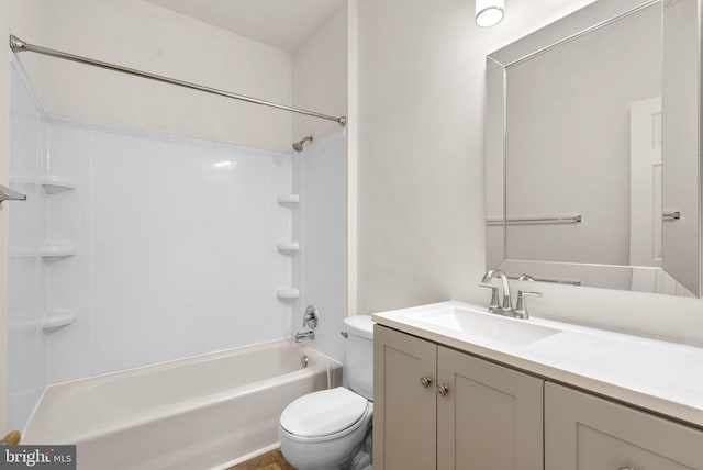 full bathroom with shower / tub combination, vanity, and toilet