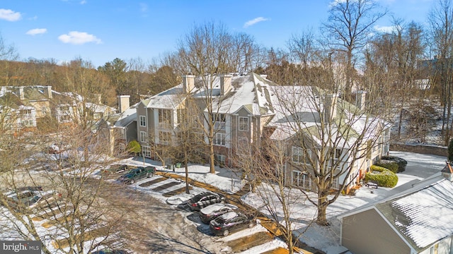 view of snow covered property