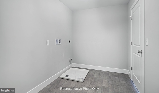 laundry room with hookup for a washing machine, dark hardwood / wood-style floors, and electric dryer hookup