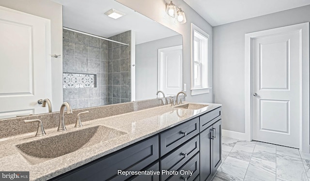 bathroom featuring vanity and walk in shower