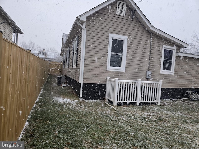 view of home's exterior with central AC