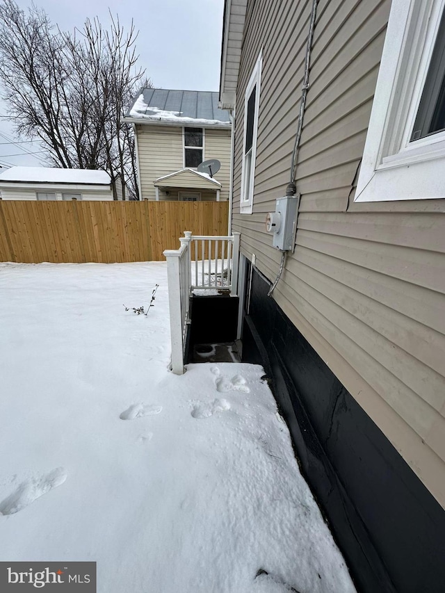 view of yard covered in snow